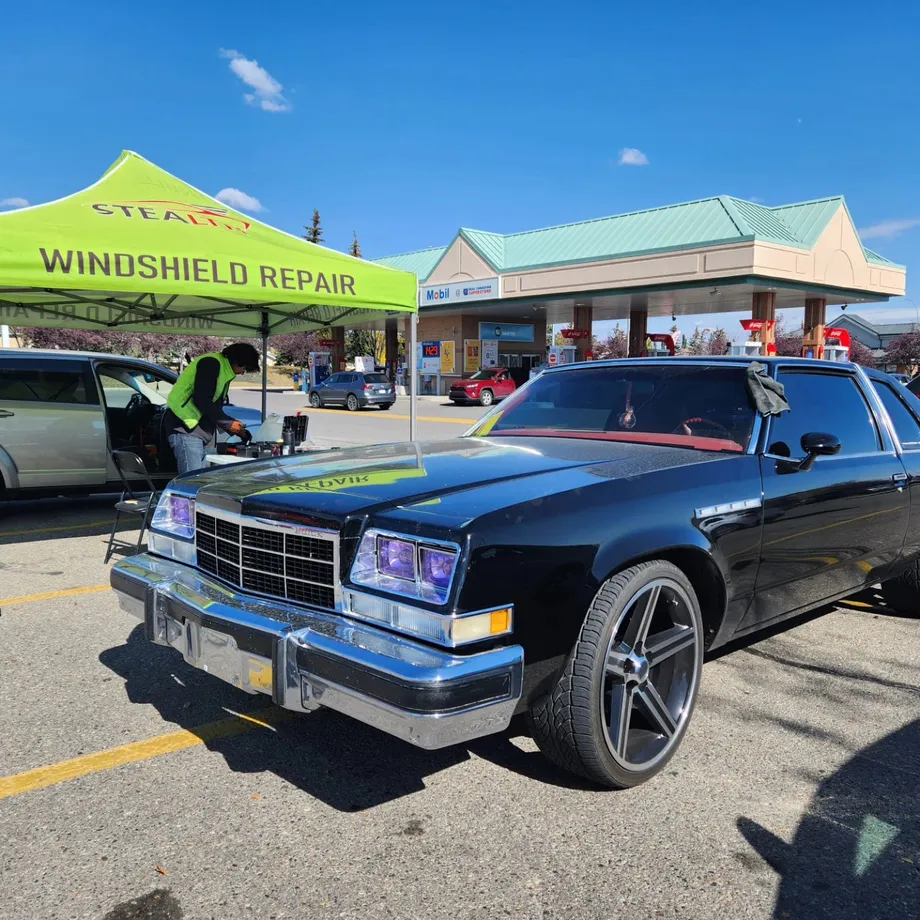 A beautiful classic 1978 Buick Electra Limited Coupe after windshield chip repair at one of our Stealth Windshield Repair tents